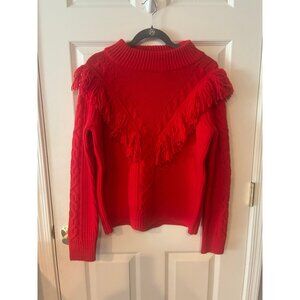 The Tuckernuck Red Fringe Caswell Sweater is a fun and unique update to a classi